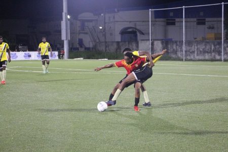 A moment from the KFC Elite League in the Buxton United (yellow) and Monedderlust encounter