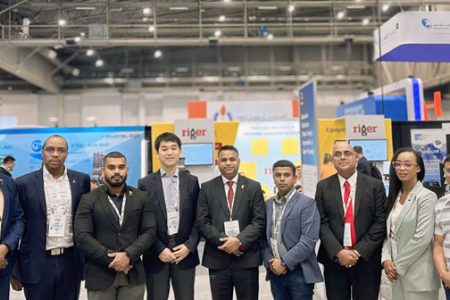 Guyana and MODEC representatives in Houston Texas. At left is GCCI President Kester Hodson; Fifth from left is Guyana’s Energy Minister Vickram Bharrat