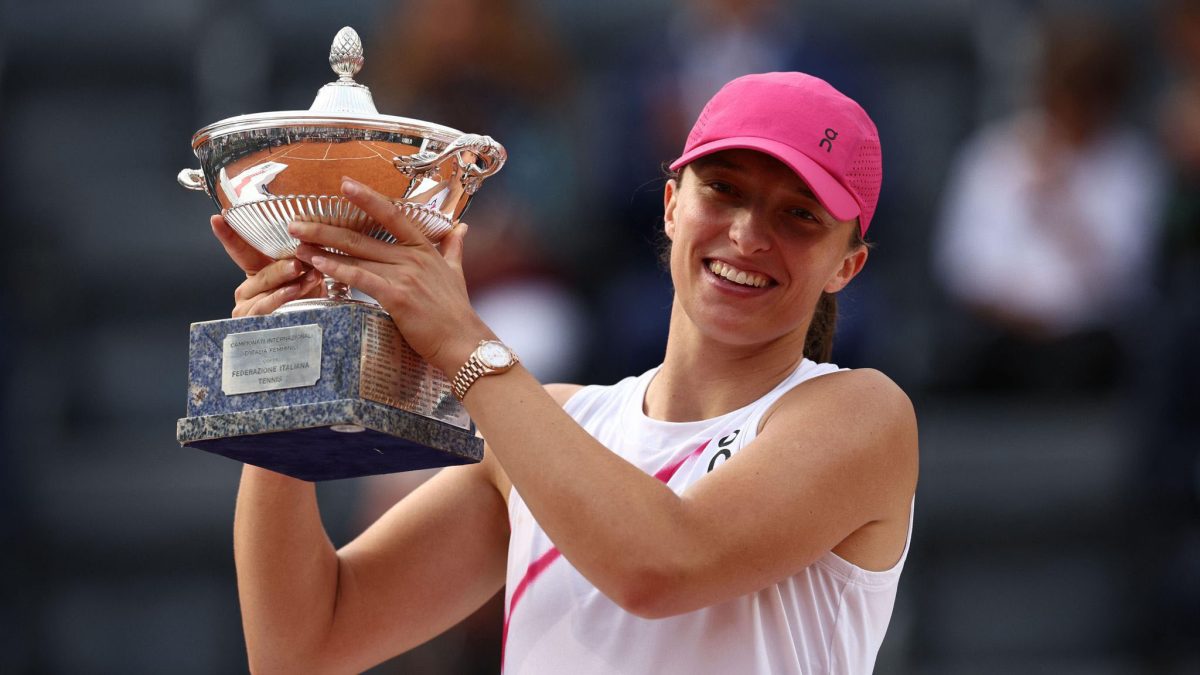 Iga Swiatek celebrates after winning the Italian Open