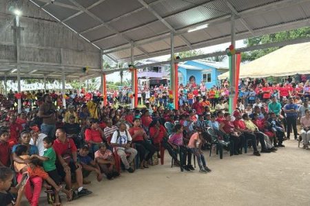 A section of the crowd gathered at White Water for a community meeting with President Irfaan Ali yesterday (DPI photo)