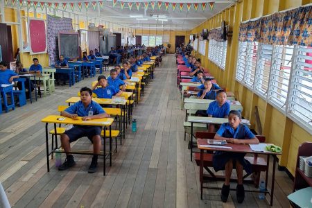 Pupils of Craig Primary on day two of the National Grade Six Assessment yesterday. (Ministry of Education photo)