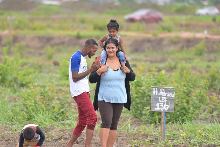 One of the families after identification of their lot (CH&PA photo)