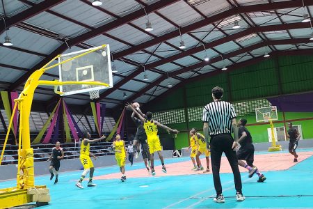 A scene from the Tertiary Basketball League which
commenced on Sunday at the National Gymnasium.
