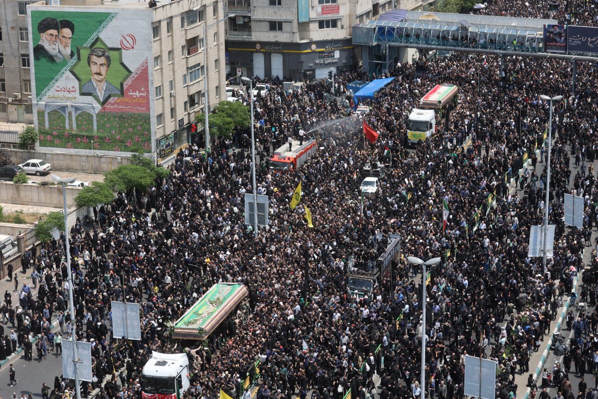 Mourners attend the funeral for victims of the helicopter crash that killed Iran’s President Ebrahim Raisi, Foreign Minister Hossein Amirabdollahian and others, in Tehran, Iran, May 22, 2024. Majid Asgaripour/WANA (West Asia News Agency) via REUTERS