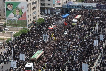 Mourners attend the funeral for victims of the helicopter crash that killed Iran's President Ebrahim Raisi, Foreign Minister Hossein Amirabdollahian and others, in Tehran, Iran, May 22, 2024. Majid Asgaripour/WANA (West Asia News Agency) via REUTERS