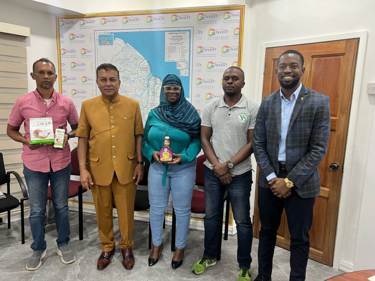 Chief Investment Officer, Dr Peter Ramsaroop is second from left.  Senior Director of Investment, John Edghill is at right. Sandra Craig of SS Natural Fruit Flavor is at centre and at left is Precision Global Vice President Lesley Ramlall.