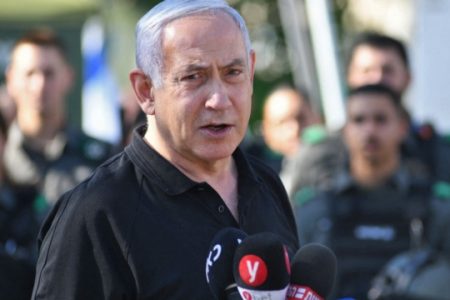 (FILES) In this file photo Israeli Prime Minister Benjamin Netanyahu speaks during a meeting with Israeli border police in the central city of Lod, near Tel Aviv, on May 13, 2021 (Photo by Yuval CHEN / POOL / AFP) (Photo by YUVAL CHEN/POOL/AFP via Getty Images)