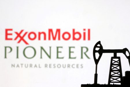 FILE PHOTO: ExxonMobil and Pioneer Natural Resources logos are seen in this illustration taken, October 8, 2023. REUTERS/Dado Ruvic/Illustration/File Photo