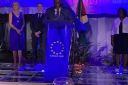 Prime Minister Mark Phillips speaking at last night’s reception. Second from left is, EU Ambassador to Guyana René van Nes. At right is the Prime Minister’s wife, Mignon Phillips.  At left is the Ambassador’s wife, Jeanette van Nes. 