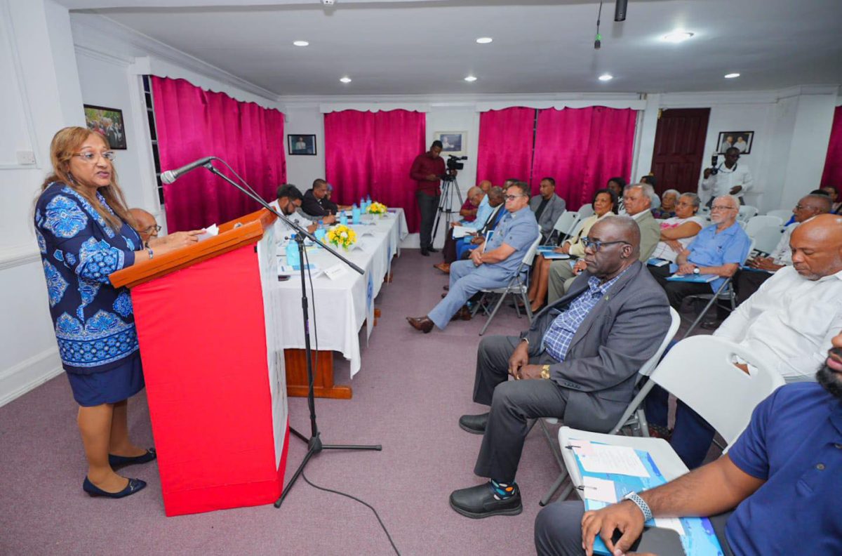 Sandra Baptiste speaking at the launch of her book (Office of the President photo)