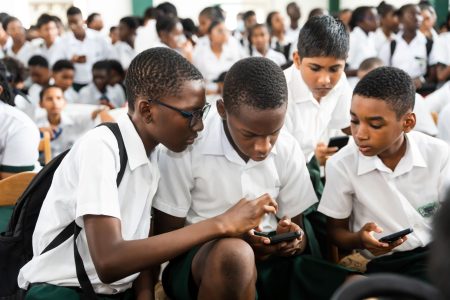 Students signing up for the game