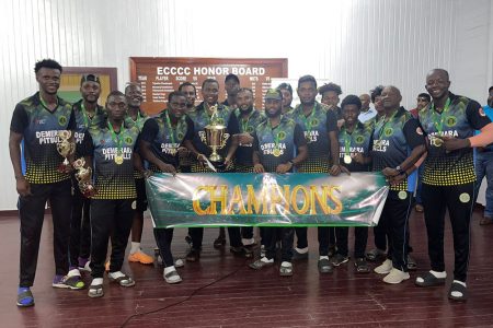 The Champions of the inaugural GCB T10 Blast, the Demerara Pitbulls, pose with their trophies at the Enmore Community Centre Ground.