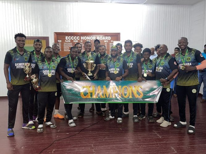 The Champions of the inaugural GCB T10 Blast, the Demerara Pitbulls, pose with their trophies at the Enmore Community Centre Ground.