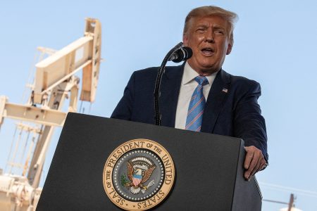 FILE PHOTO: U.S. President Donald Trump delivers a speech during a tour of the Double Eagle Energy Oil Rig in Midland, Texas, U.S., July 29, 2020. REUTERS/Carlos Barria/File Photo
