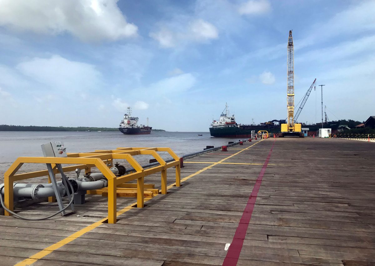 Vessels carrying supplies for an offshore oil
platform operated by Exxon Mobil are seen at the Guyana Shore Base Inc wharf on the Demerara River, south
of Georgetown, Guyana January 23, 2020. REUTERS/Luc
Cohen/ File
