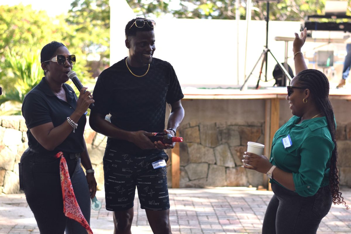 The #MenInMaroon took a moment yesterday to meet and greet with CWI staff after training in Antigua. (Windies Cricket photo)