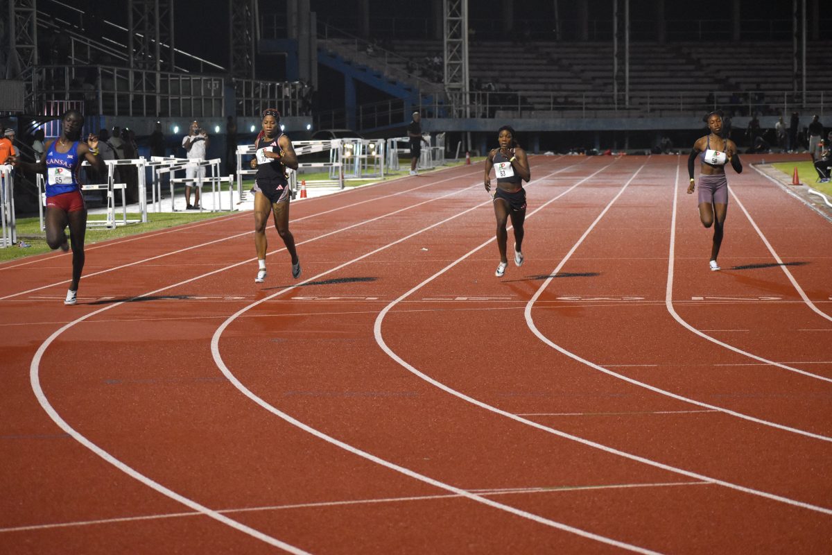 Guyanese Deshana Skeete (left) claims gold in the women’s 200m (Zaheer Mohamed photo)
