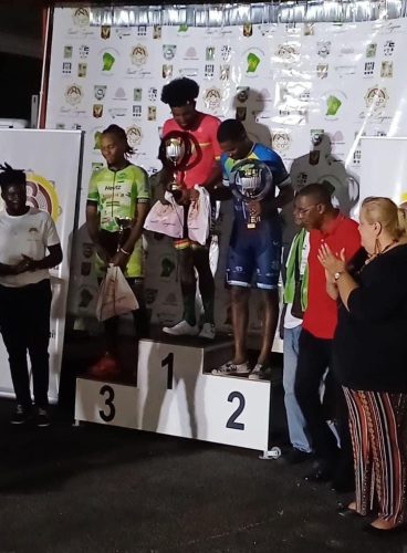 Guyana’s Briton John stands atop the
podium after winning the first stage of the Grand Prix L’Ouest Guyanais in Suriname