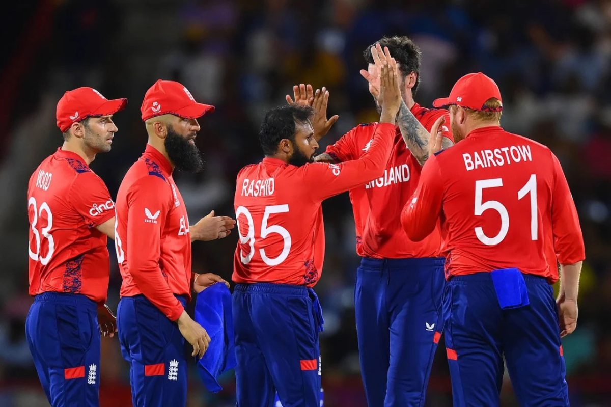 England celebrates the dismissal of Andre Russell for one, as he was dismissed by Adil Rashid