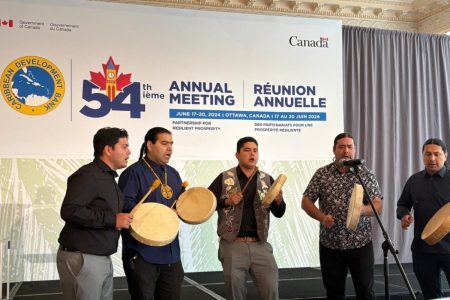 Members of Eagle River, an Algonquin drum group from Kitigan Zibi and Barrier Lake in Quebec, Canada perform at the Indigenous Peoples Forum, staged by the Caribbean Development Bank yesterday to kick off the Bank’s 54th Annual Meeting.