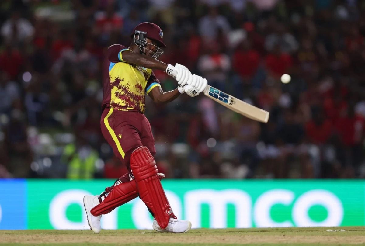 Rescue! Shurfane Rutherford dispatches a delivery into the crowd during his unbeaten 68 runs from 39 balls