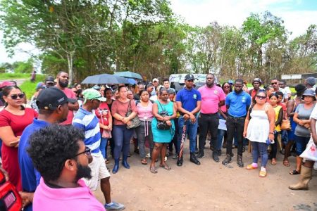 The residents being briefed by members from the Guyana Lands and Survey Commission (GLSC) and Minister Kwame McCoy (DPI photo)

