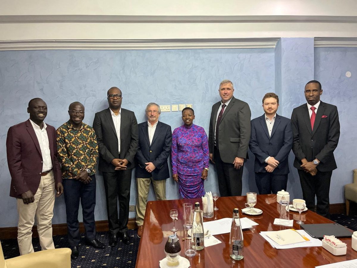 Davis Kisotu, Serge Musasilwa, Daniel Jean Louis, Fred Eppright, Rachel Ruto, John Braland, Matt Eppright and Julius Suubi pose for a photograph in Austin, Texas, U.S. in this picture released on May 24, 2024. Fred Eppright/Handout via REUTERS