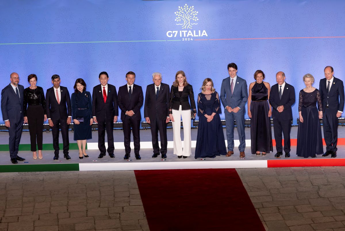 British Prime Minister Rishi Sunak, Canadian Prime Minister Justin Trudeau, French President Emmanuel Macron, German Chancellor Olaf Scholz, Italian Prime Minister Giorgia Meloni, Japanese Prime Minister Fumio Kishida, Italian President Sergio Mattarella, European Commission President Ursula von der Leyen and European Council President Charles Michel pose for a family photo as they arrive to attend a dinner at Swabian Castle in Brindisi, Italy, June 13, 2024. Italian Presidency/Handout via REUTERS