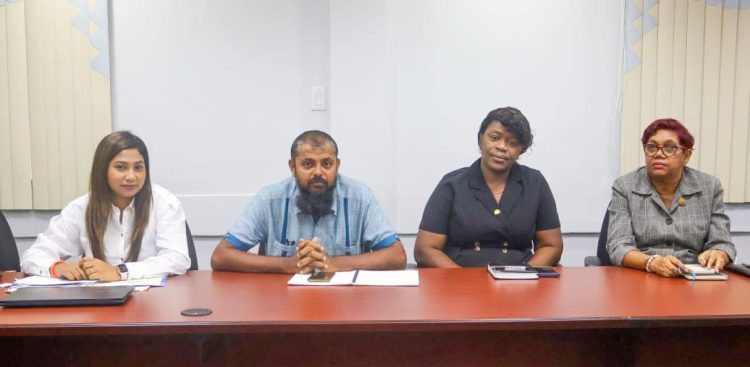 The government team at the meeting yesterday (Ministry of Education photo)