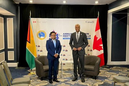 Minister of Finance Ashni Singh (left) with Canadian Minister of International Development Ahmed Hussen (Ministry of Finance photo)