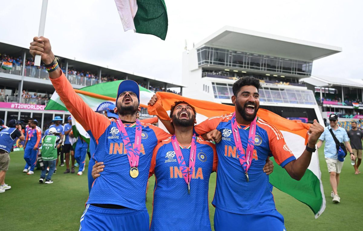  Indian cricketers celebrate after yesterday’s World Cup T20 victory in Barbados. See sports pages. (Getty images)