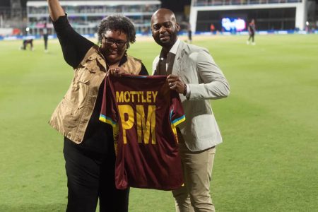  Barbadian Prime Minister Mia Mottley (left) and Cricket West Indies President Dr. Kishore Shallow celebrating yesterday’s West Indies victory over the USA in the ICC T20 tourney at the Kensington Oval in Barbados. (Windies Cricket photo)
