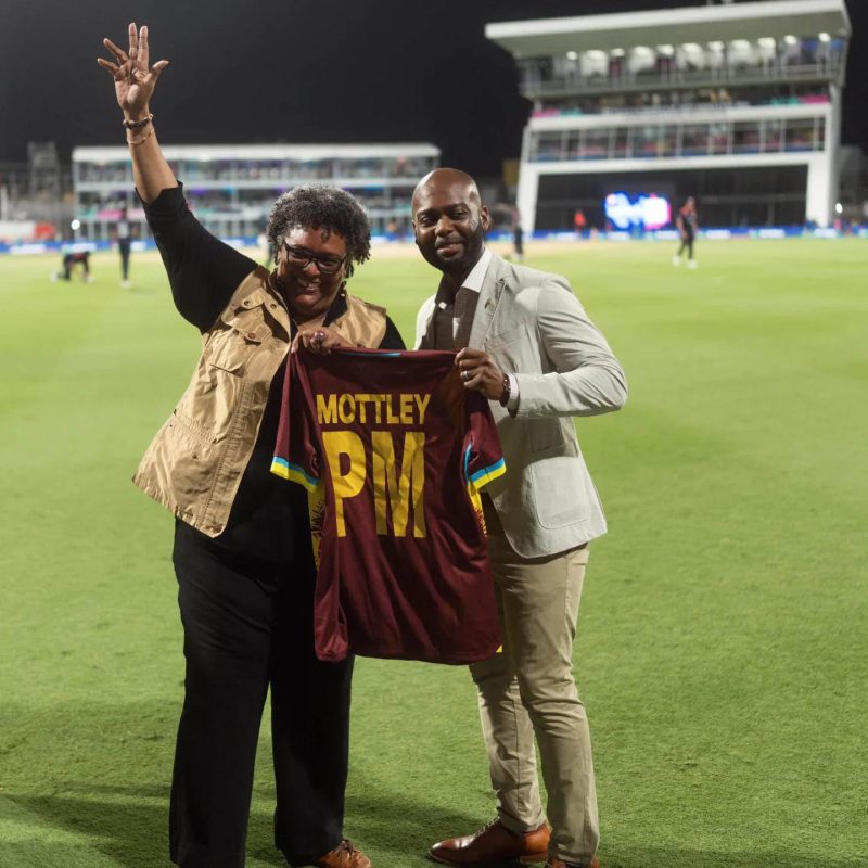  Barbadian Prime Minister Mia Mottley (left) and Cricket West Indies President Dr. Kishore Shallow celebrating yesterday’s West Indies victory over the USA in the ICC T20 tourney at the Kensington Oval in Barbados. (Windies Cricket photo)
