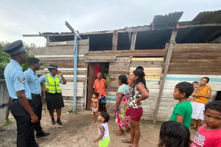 Sergeant Mitchell-Caleb, along with other ranks of the Sparendaam Police Station, conducted a community engagement within the Montrose community on the East Coast of Demerara on Tuesday.  (Police photo)