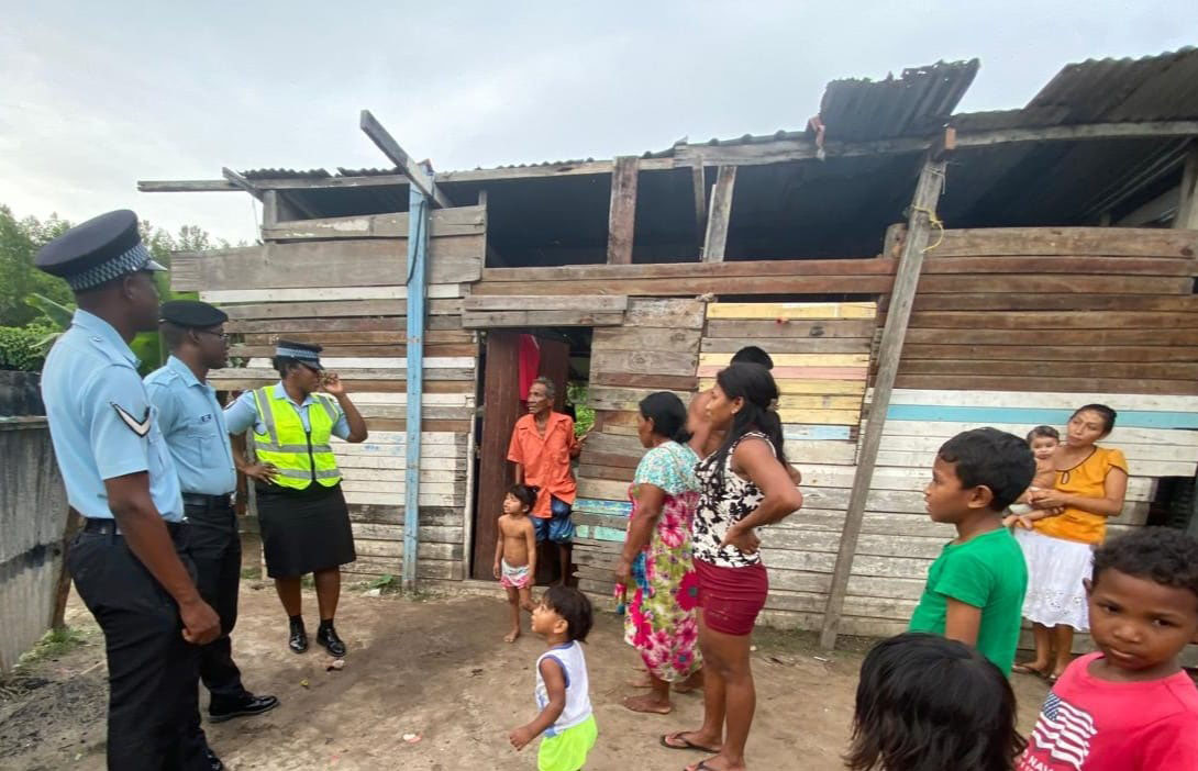 Sergeant Mitchell-Caleb, along with other ranks of the Sparendaam Police Station, conducted a community engagement within the Montrose community on the East Coast of Demerara on Tuesday.  (Police photo)