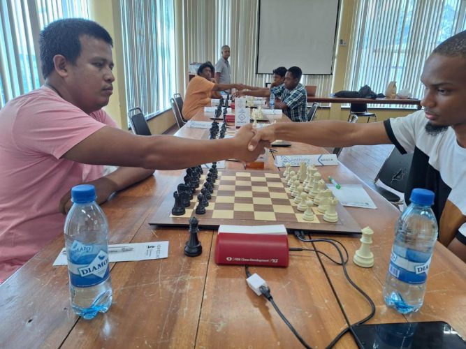 Two of the participants of the 2024 National Open
Chess Championship Justino Da Silva (left) and Anthony
Drayton who excelled in the National Qualifiers Tournament