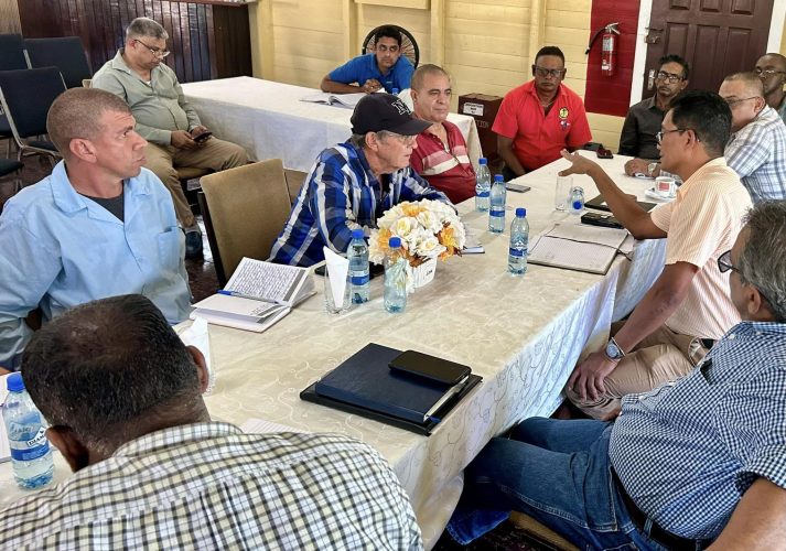 Paul Cheong, hand outstretched, speaking to the Cuban experts on Friday (GuySuCo photo)