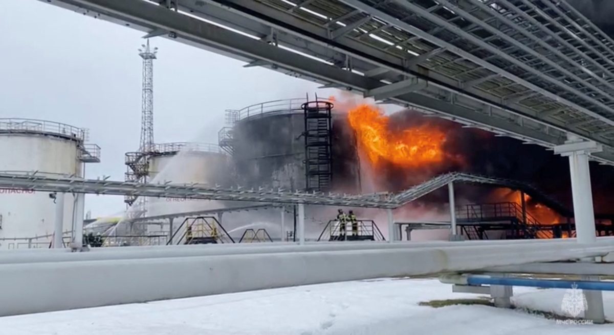Firefighters extinguish oil tanks at a storage facility that local authorities say caught fire after the military brought down a Ukrainian drone, in the town of Klintsy in the Bryansk Region, Russia January 19, 2024, in this still image taken from video. Russian Emergencies Ministry/Handout via REUTERS