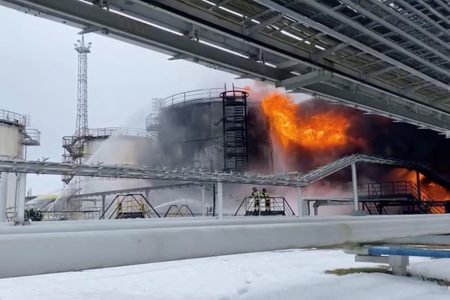 Firefighters extinguish oil tanks at a storage facility that local authorities say caught fire after the military brought down a Ukrainian drone, in the town of Klintsy in the Bryansk Region, Russia January 19, 2024, in this still image taken from video. Russian Emergencies Ministry/Handout via REUTERS