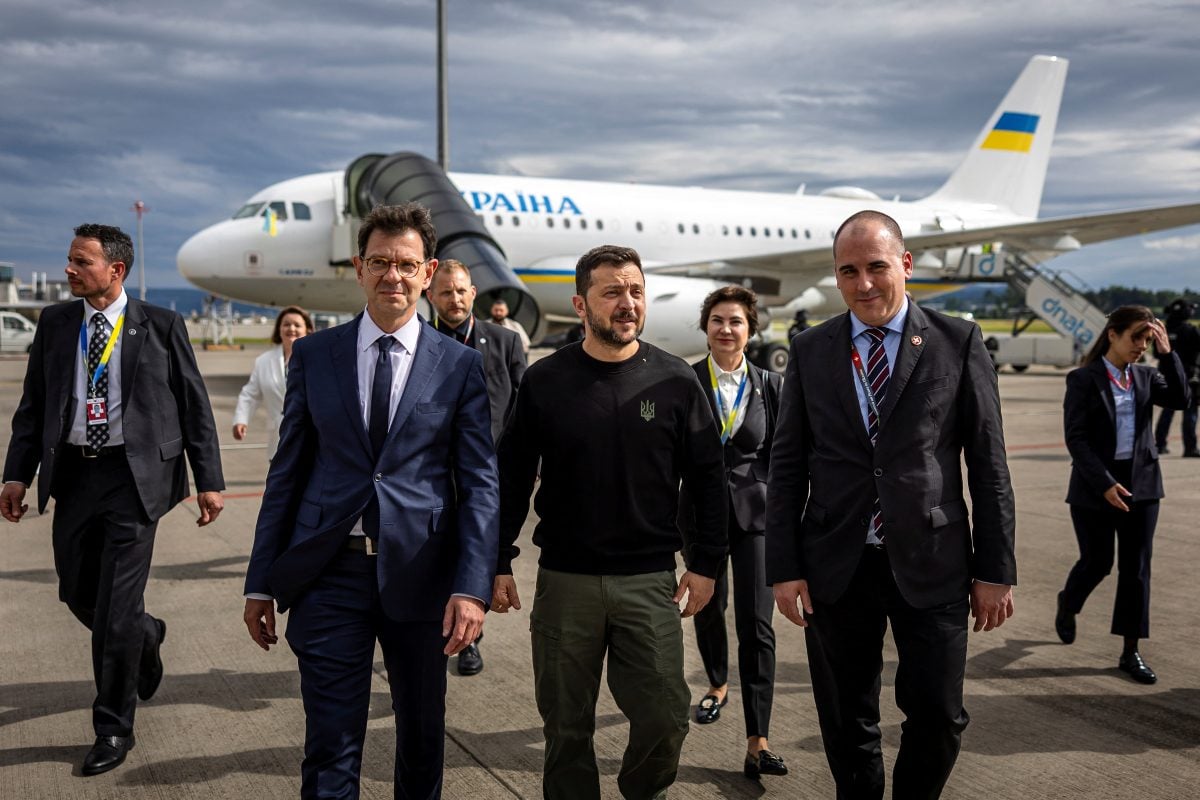 Ukrainian President Volodymyr Zelenskiy is accompanied by Ambassador of Switzerland to Ukraine Felix Baumann, Deputy Head of Swiss Protocol Manuel Irman, and Ukrainian Ambassador to Switzerland Iryna Venediktowa, as he arrives at Zurich airport, Switzerland June 14, 2024. Zelenskyy will attend the Summit on Peace in Ukraine conference to be held on June 15 and 16 at the Buergenstock Resort in central Switzerland. Michael Buholzer/Pool via REUTERS