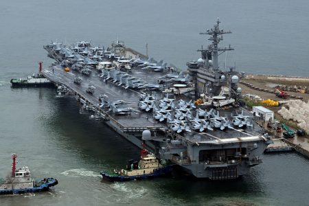 The Theodore Roosevelt (CVN 71), a nuclear-powered aircraft carrier is anchored in Busan, South Korea, June 22, 2024. Song Kyung-Seok/Pool via REUTERS