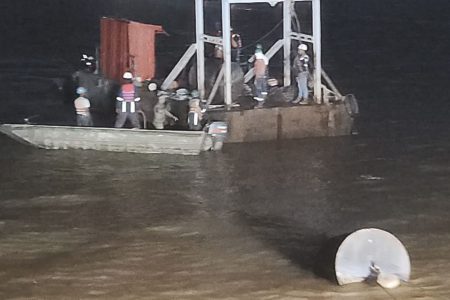 Workers  from the DHB working to restore the damaged anchorage system (a MoPW photo)