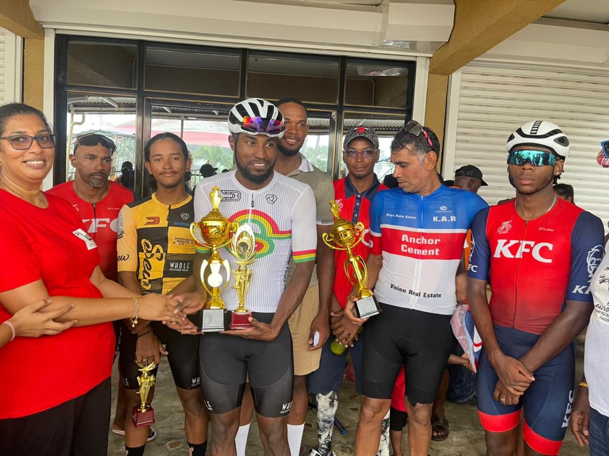 Overall race winner Briton John (centre) poses with the other category winners at the 2nd Annual Rajkumar & Daughter Memorial Cycling Road Race in Berbice