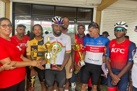 Overall race winner Briton John (centre) poses with the other category winners at the 2nd Annual Rajkumar & Daughter Memorial Cycling Road Race in Berbice