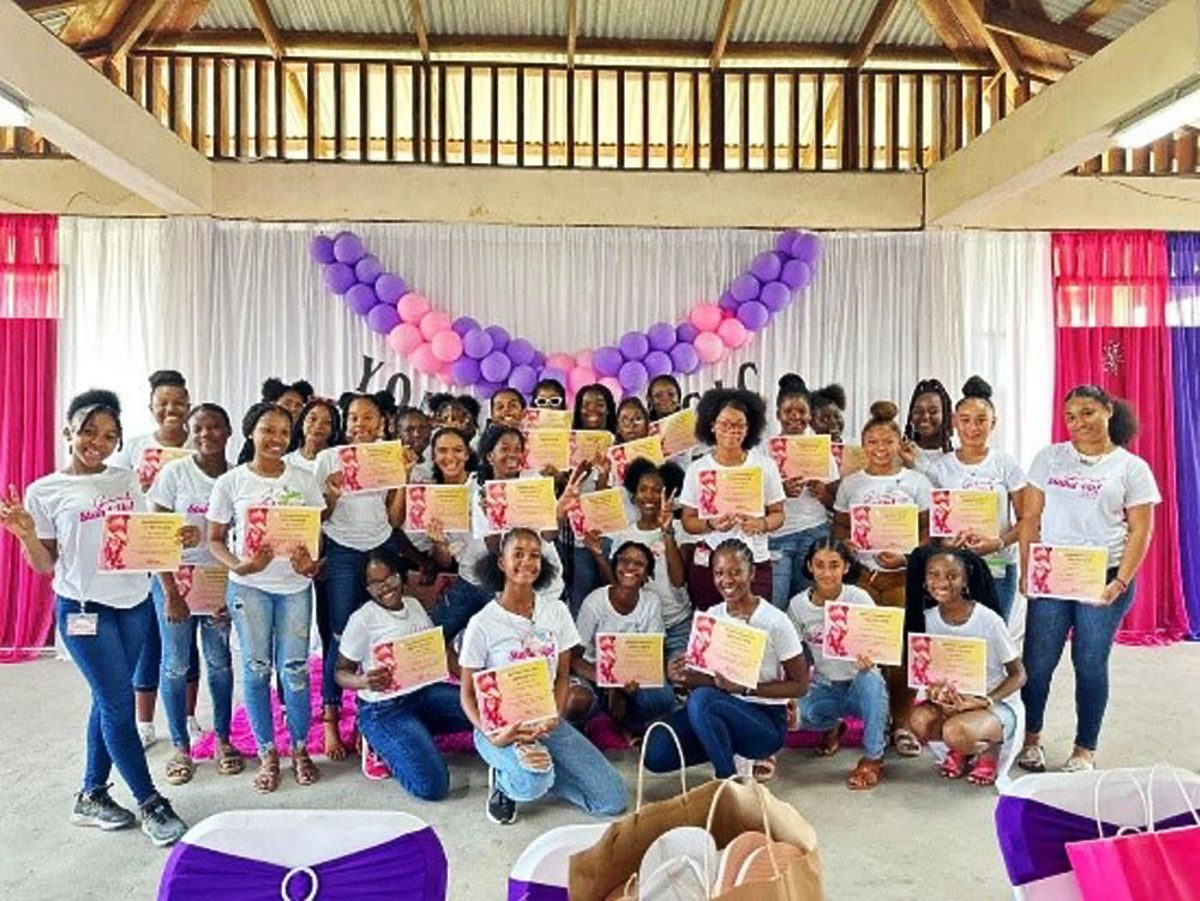 Girl Stand Up! members posing with their certificates