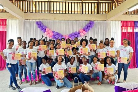 Girl Stand Up! members posing with their certificates