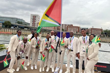 Guyana’s delegation, which also comprises members of the coaching staff, are all smiling prior to the commencement of the opening ceremony, which was conducted on the Seine River. Guyana will be represented by flagbearers Emmanuel Archibald (athletics) and Chelsea Edghill (table tennis), as well as swimmers Raekwon Noel and Aleka Persaud and athlete Aliyah Abrams.
