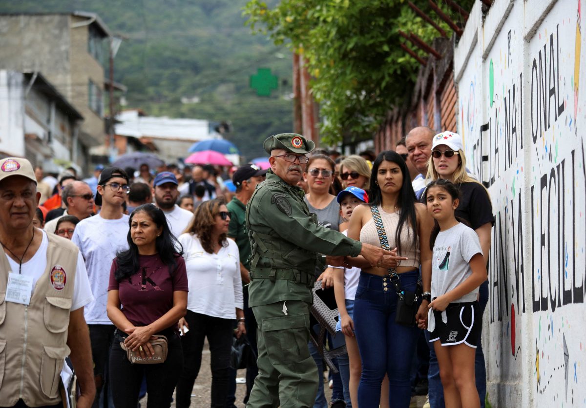 People line up to cast their votes in Venezuela's presidential election, in San Cristobal, Venezuela July 28, 2024. REUTERS/Carlos Eduardo Ramirez