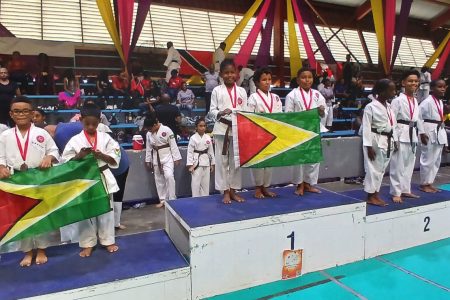 The Guyanese made a clean sweep in the team Kata (brown) male 8-10, with the trio of Kayden Savoury, Josiah Clinken, and Wyatt Savoury occupying the top podium spot.