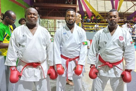 The Guyanese combination (from left) of Malcolm Francis, Jason Jerrick, and Keith Beaton captured gold in the men’s 40-49 team section of Kata, Bunkai, Kumite, and Enbu